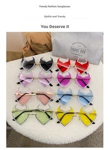 Detailed view of frameless devil horn heart sunglasses in 8 different colorful lens shades