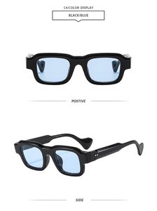 Detail view of square black sunglasses with blue lenses and wavy metal rivet temples