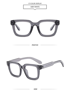 Detailed front and side views of square grey and white translucent glasses frames