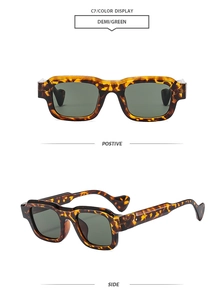 Vista detallada de gafas de sol cuadradas de carey con lentes verdes y remaches