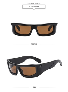Détail de lunettes de soleil sportives à monture large noir mat et verres teintés bruns
