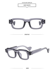 Detail view of stylish grey-white translucent sunglasses showing front and side profile