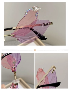 Macro view of crystal bee accent and rhinestones on dragonfly wing sunglasses