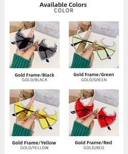 Detail shot of four rhinestone heart-shaped sunglasses in gold, black, green, and red