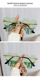 Detail of green heart sunglasses with gold frame and sparkling rhinestone tassel fringe