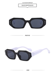 Front and side view of chunky black and white polygon sunglasses with silver dots