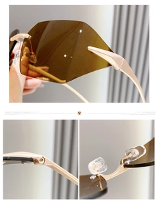 Détail de lunettes de soleil carrées sans monture avec verres bruns et charnières dorées