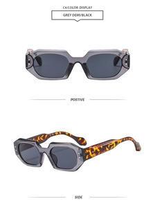 Detail view of C4 polygon sunglasses with grey transparent frame and tortoise temples