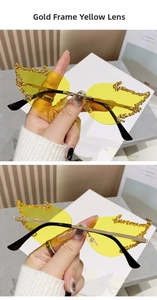 Detail of yellow flame sunglasses with gold frame and rhinestone accents for parties