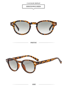 Detail view of oval retro sunglasses in demi frame with silver rivets and green lenses