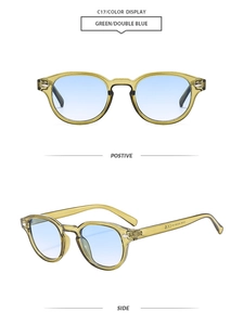 Detail of retro oval tea green acetate frame with gradient blue lenses and silver rivets