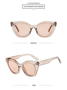 Dettaglio degli occhiali da sole cat-eye marrone chiaro con rivetti argentati e lenti sfumate