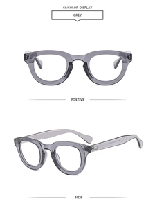 Macro detail of grey retro sunglasses showing front and side views with specifications