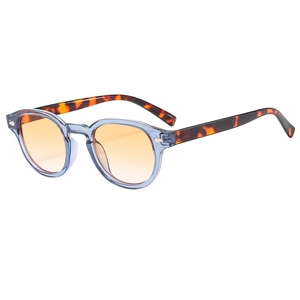 Retro oval sunglasses with light blue frames, orange lenses and tortoiseshell temples