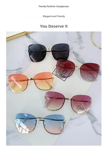 Flat lay of rimless butterfly sunglasses in various gradient lens colors with gold metal temples