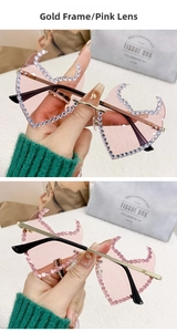 Detail of pink flame-shaped rimless sunglasses with hand-set rhinestones on gold frame