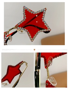 Détail de lunettes de soleil rouges en forme d'étoile avec strass et monture en métal doré