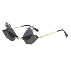 Trendy dragonfly wing rimless sunglasses with gray lenses and rhinestone accents