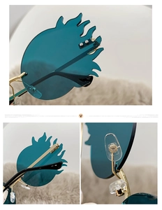 Détail de lunettes de soleil sans monture en forme de flamme avec monture dorée en métal