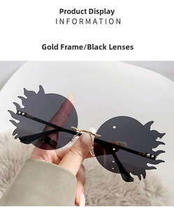 Détail de lunettes de soleil sans monture en forme de flamme avec pont doré et verres gris