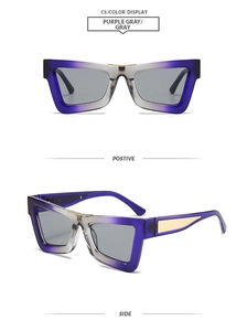 Detail view of purple cat-eye sunglasses featuring golden temple accents and gradient lenses