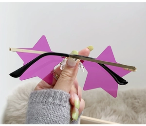 Close-up of purple star-shaped rimless sunglasses with gold metal temples and clear nose pads