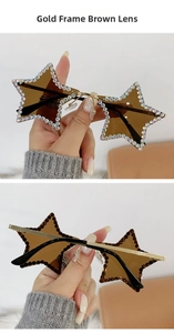 Détail du pont en métal doré et verres marron en étoile avec strass étincelants