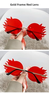 Détail de lunettes de soleil sans monture en forme de flamme rouge avec branches en or