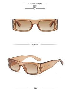 Close-up of retro tea-colored rectangular sunglasses with translucent thick frames