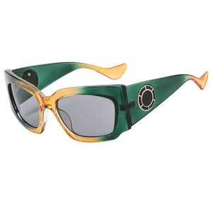 Lunettes de soleil cat eye dégradé vert avec décoration métallique sur les branches