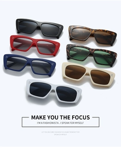 Flat lay of retro rectangle sunglasses in seven colors with triple metal rivets