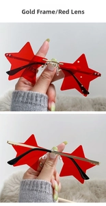 Star shaped rimless sunglasses with red lenses and gold metal frame shown in detail