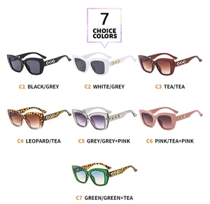 Detail view of colorful cat eye sunglasses collection with hollow metal ring temples