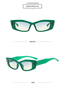 Detail of green sunglasses with gold square rivets and blue-yellow gradient lenses