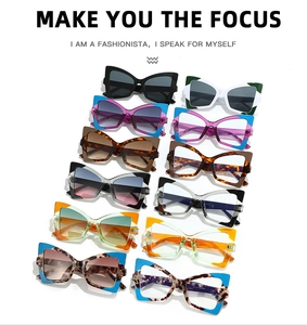 Flat lay of colorful butterfly cat eye sunglasses in various patterns and lens colors