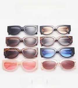 Matrix display of eight vintage cat-eye sunglasses in various colors and lens tints