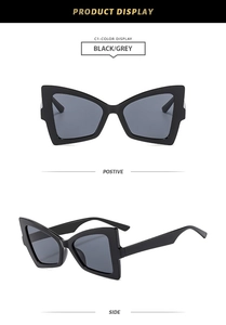 Front and side view of butterfly cat-eye sunglasses in black frame with grey lenses