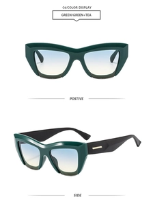 Detail view of vintage cat-eye sunglasses in deep green with gradient tea lenses
