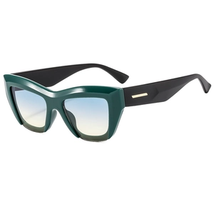 Vintage oversized cat-eye sunglasses with dark green thick frames and gradient lenses