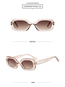 Detail view of champagne oval sunglasses with gradient tea lenses and transparent frames