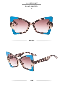 Detail of butterfly sunglasses with tortoise shell frame and contrasting blue temples
