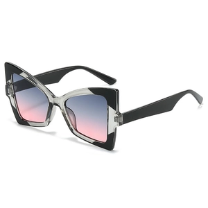 Fashionable cat eye butterfly sunglasses with bicolor frame and blue pink gradient lenses