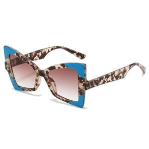 Fashion butterfly cat-eye sunglasses with tortoiseshell frame and blue color-block detail