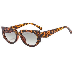 Retro square cat-eye sunglasses with tortoiseshell frames and light grey lenses