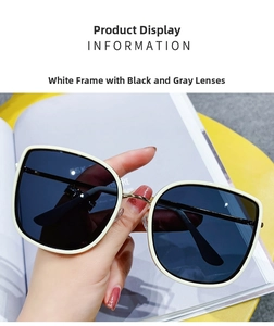 Detail view of white square frame sunglasses with metal bridge and dark grey lenses