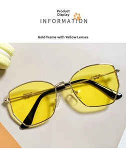 Detail view of stylish kids sunglasses with gold metal frames and yellow lenses