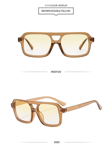Detail view of square double-bridge sunglasses with transparent brown frame and yellow lenses