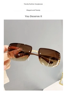 Close-up of semi-rimless sunglasses with brown gradient lenses and rhinestone accents