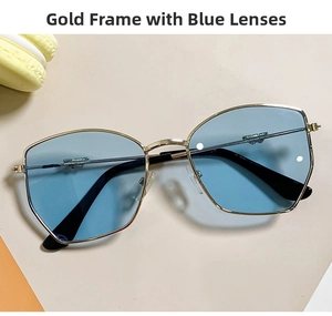 Detailed view of children's gold metal sunglasses with light blue translucent lenses