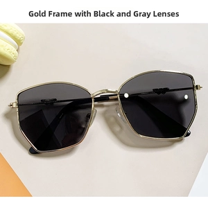 Detail of children's geometric gold metal sunglasses with dark grey UV400 lenses